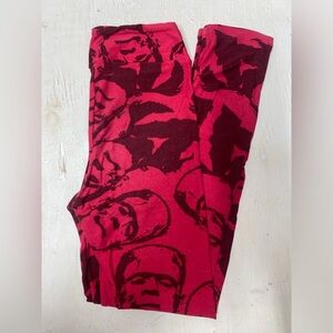 Lularoe Girls L/XL leggings. Frankenstein print in a raspberry red. USED